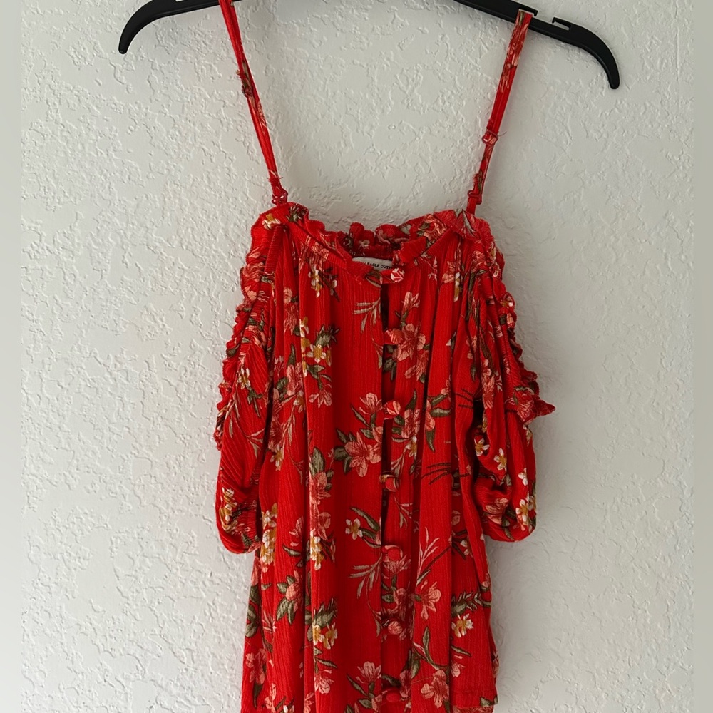 red floral spaghetti strap shirt
